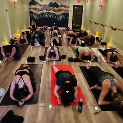 Serenity Yoga Studio - Pigeon Pose in Hot Vinyasa Class
