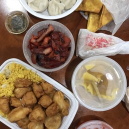 a table full of chinese food