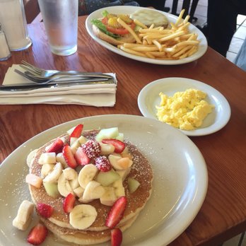 Diggery Inn - Pancakes with fruit, side scrambled egg, and a cheeseburger with fries - Breakfast & Brunch Near Me - Oakland, California