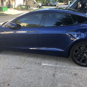 Florida Car Wrap - Chrome delete: notice the handles, side-view mirrors & door frame - Vehicle Wraps Near Me - Davie, Florida