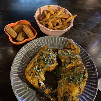 Frangos Peri Peri - Half chicken with fries and Jalapeno Poppers - Portuguese Near Me - New York, New York Frangos Peri Peri - Half chicken with fries and Jalapeno Poppers - Portuguese Near Me - New York, New York