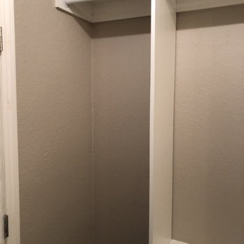 Munoz Cabinetry - After. Long dress hanging area next to hamper. - Cabinetry Near Me - Bakersfield, California