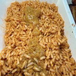 Project Suya - Jollof rice with hot sauce - food - African Near Me - Silver Spring, Maryland