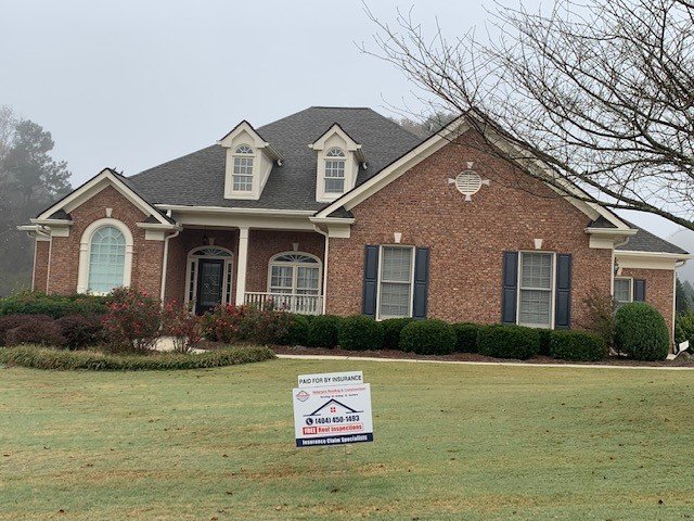 Slide of Veteran's Roofing Company