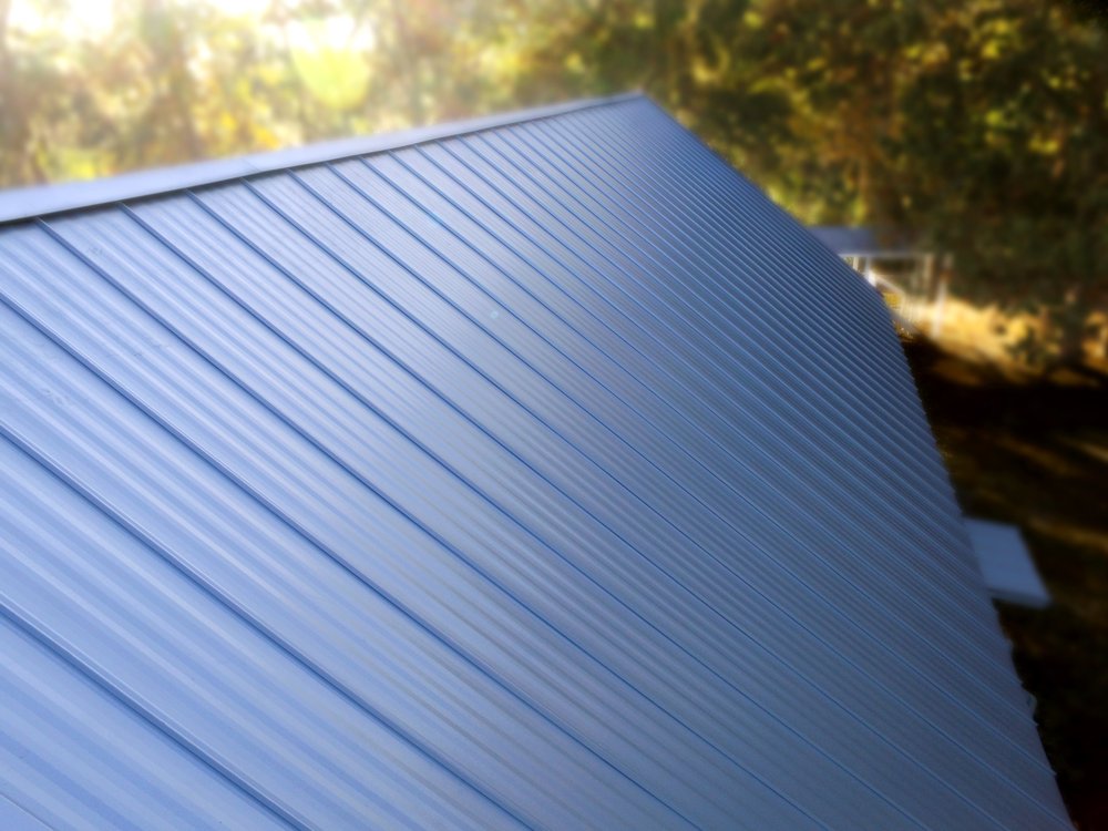 Slide of TMT Roofing