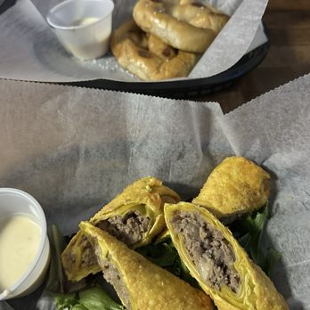 The GOAT Bar & Grill - Pretzels with queso and Philly egg rolls - Bars Near Me - Murrells Inlet, South Carolina