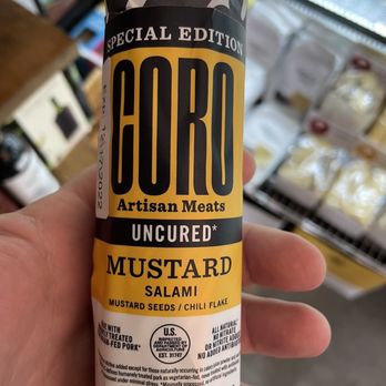 South Slope Cheese - a hand holding a can of goro mustard - Cheese Shops Near Me - Asheville, North Carolina South Slope Cheese - a hand holding a can of goro mustard - Cheese Shops Near Me - Asheville, North Carolina