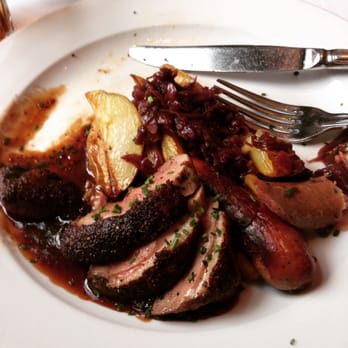 Lindey's - Spiced Duck with Foie Gras Sausage, Roasted Fingerling Potatoes, Braised Red Cabbage - New American Near Me - Columbus, Ohio Lindey's - Spiced Duck with Foie Gras Sausage, Roasted Fingerling Potatoes, Braised Red Cabbage - New American Near Me - Columbus, Ohio