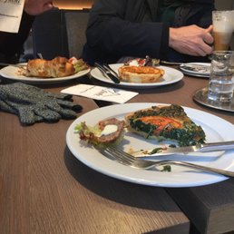Spinach pie, cheese pie, hot dog wrapped with croissant and Irish coffee Spinach pie, cheese pie, hot dog wrapped with croissant and Irish coffee
