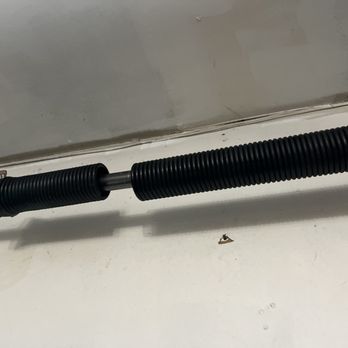 BH Garage Door - The broken spring - Garage Door Services Near Me - Chicago, Illinois