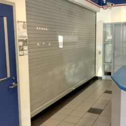 US Post Office - Window service counter partition in downward closed position, unrepaired, for MONTHS!