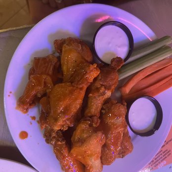 Mango's - Happy Hour $10.00 for 10 wings. The wings are good. Perfect football food specials. - Caribbean Near Me - Bethany Beach, Delaware Mango's - Happy Hour $10.00 for 10 wings. The wings are good. Perfect football food specials. - Caribbean Near Me - Bethany Beach, Delaware