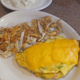 Denver Omelet with cheese on top, hashbrowns and of course biscuits and gravy!
