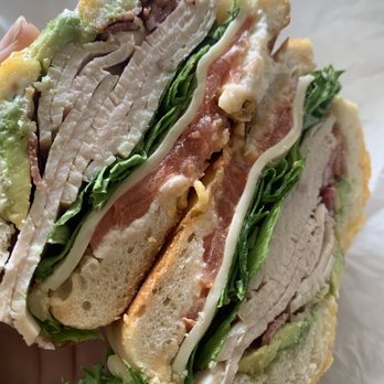Bagel Kitchen - Turkey nightclub on a bacon cheddar bagel. - Bagels Near Me - Pacific Grove, California