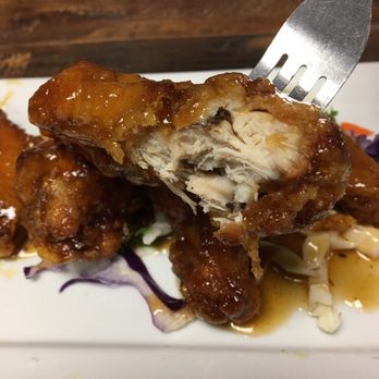 Caribbean Haven - Inside view of chicken wing - a bit dry - Caribbean Near Me - Ventura, California