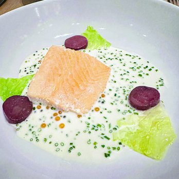Knife Pleat - Ora king salmon - cabbage, fingerling potato choucroute jus emulsion smoked trout roe & cavier - French Near Me - Costa Mesa, California Knife Pleat - Ora king salmon - cabbage, fingerling potato choucroute jus emulsion smoked trout roe & cavier - French Near Me - Costa Mesa, California
