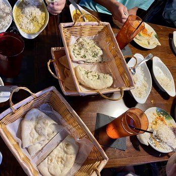 Thamel Beer Garden - Butter Chicken, Chicken Tikka Masala, Shrimp Curry, Chicken Curry, plain, butter, and garlic naan. All amazing! - Indian Near Me - Euless, Texas