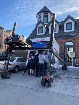 Loading and Unloading - Call (303) 335-0525 for a free estimate.
