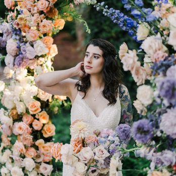 Wild Earth - Bride with Florals - Floral Designers Near Me