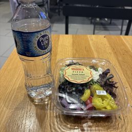 Entree salad compared to a water bottle. Entree salad compared to a water bottle.