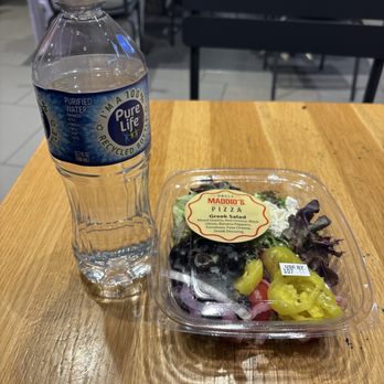 Uncle Maddio's Pizza - Entree salad compared to a water bottle. - Pizza Near Me - Atlanta, Georgia Uncle Maddio's Pizza - Entree salad compared to a water bottle. - Pizza Near Me - Atlanta, Georgia