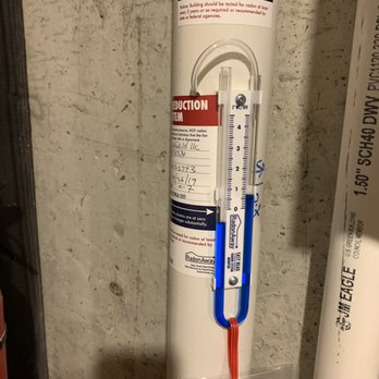 Radon Shield - Negative pressure monitor in basement - Environmental Testing Near Me
