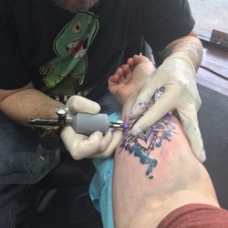 Alchemy Tattoos and Body Piercing