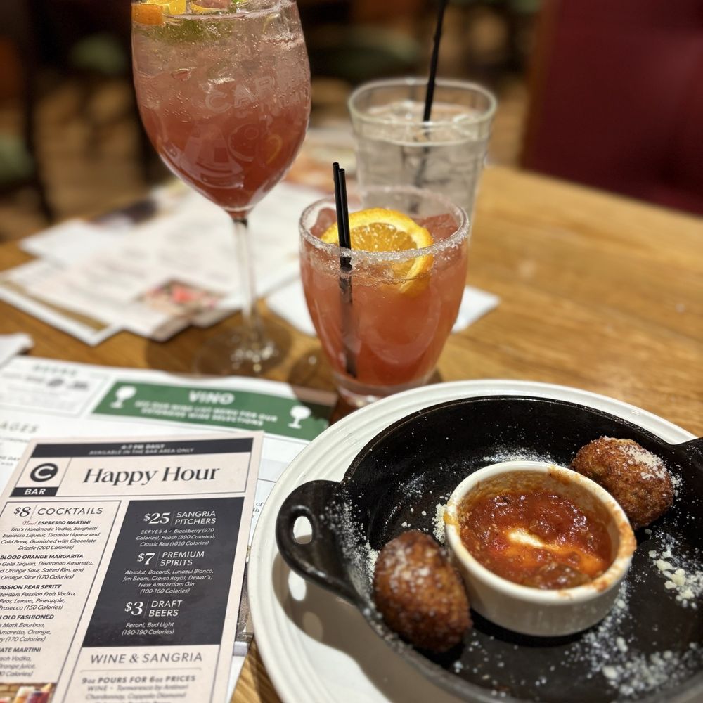Carrabba's Italian Grill - Passion pear spritz and blood orange margarita / fennel sausage arancini - Italian Near Me - Gainesville, Florida
