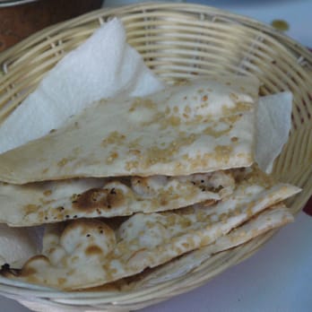 India Grill - a basket of flatbreads on a table - Indian Near Me - Bellingham, Washington India Grill - a basket of flatbreads on a table - Indian Near Me - Bellingham, Washington