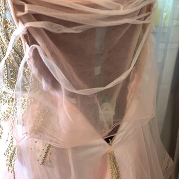 Sophie's Boutique - The back which I couldn't see the material is awful and if dont even tie t - Bridal Near Me