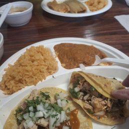 Tacos with rice and beans and tamales with rice and beans lunch special $10.10 Tacos with rice and beans and tamales with rice and beans lunch special $10.10