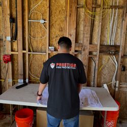 Prestige Fire Protection - Project foreman going over new construction plans for a residential fire sprinkler system install.