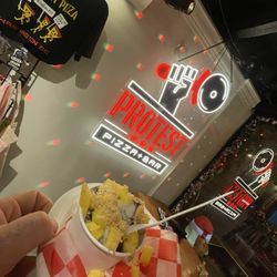 Protest Pizza + Bar - Açaï- Tart Yogurt froyo with mango & coconut crunch topping