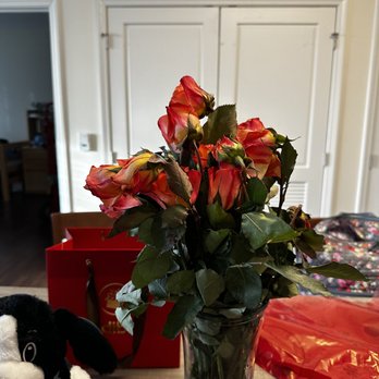 Edible Arrangements - a bouquet of roses in a vase on a table - Gift Shops Near Me - Winston-Salem, North Carolina Edible Arrangements - a bouquet of roses in a vase on a table - Gift Shops Near Me - Winston-Salem, North Carolina