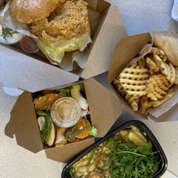 Fried chicken sandwich, waffle fries, salad, scallop