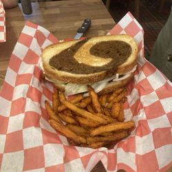 Retriever on rye bread with bread, sweet potato fries