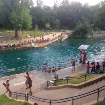 Barton Springs Pool - The view from above of the part of the pool that was monitored by lifeguards. - Swimming Pools Near Me - Austin, Texas Barton Springs Pool - The view from above of the part of the pool that was monitored by lifeguards. - Swimming Pools Near Me - Austin, Texas