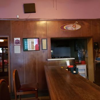 Armory Restaurant - a long wooden table and chairs - Restaurants Near Me - Buffalo, New York