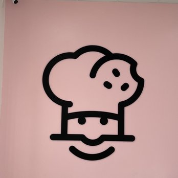 Crumbl - Mayfield - a picture of a chef's hat on a pink wall - Bakeries Near Me - Mayfield Heights, Ohio Crumbl - Mayfield - a picture of a chef's hat on a pink wall - Bakeries Near Me - Mayfield Heights, Ohio
