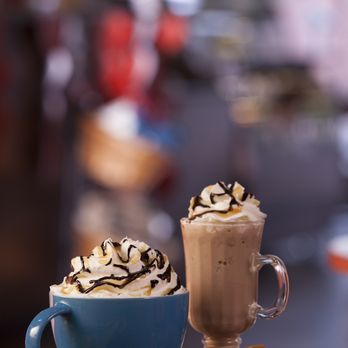 Port City Java - two cups of coffee and a slice of pizza - Coffee & Tea Near Me - Wilmington, North Carolina