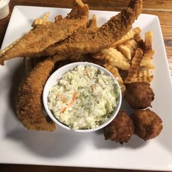 Charbroiler Restaurant - Catfish, hush puppies, fries, and coleslaw