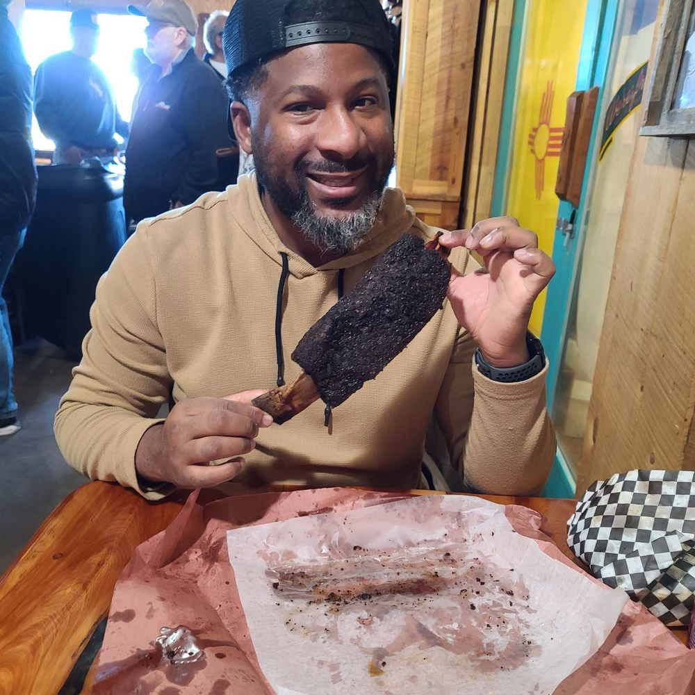 Mad Jack's Mountaintop Barbecue - He's exited about his Dino bone. - Barbeque Near Me - Cloudcroft, New Mexico