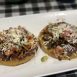 Delicias Las Catrachas - Left: Chicken Right: Steak