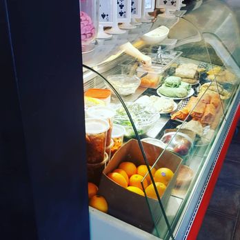Maté Latte - an assortment of food in a display case - Cafes Near Me - Montreal, Quebec