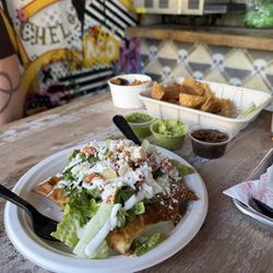 Taco Chelo - Flamingo , add chicken, Chips,Salsa + Guacamole