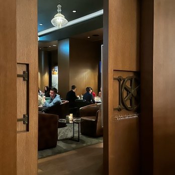 Cask Whisky Vault - people sitting in the lounge area - Whiskey Bars Near Me - Richmond, British Columbia