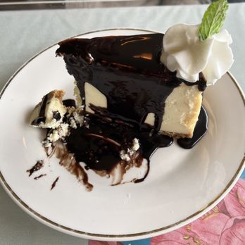 Hilltop House Restaurant and Lounge - Unbelievably delicious cheesecake topped with fudge sauce. - Lounges Near Me - North Bend, Oregon Hilltop House Restaurant and Lounge - Unbelievably delicious cheesecake topped with fudge sauce. - Lounges Near Me - North Bend, Oregon
