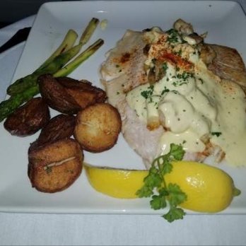 The Warehouse - Bronzini topped with crab and shrimp - Seafood Near Me - Alexandria, Virginia