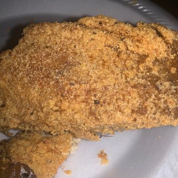 Harvey's Fish Hut - a fried fish on a paper plate - Seafood Near Me - Pearl, Mississippi Harvey's Fish Hut - a fried fish on a paper plate - Seafood Near Me - Pearl, Mississippi