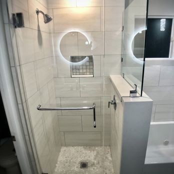 Darosa Construction - The tile work is impeccable. No detail overlooked. Also one of two custom stone caps Joe added in for me. - General Contractors Near Me